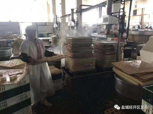 潛心研發新產品 老周食品廠房內豆香四溢